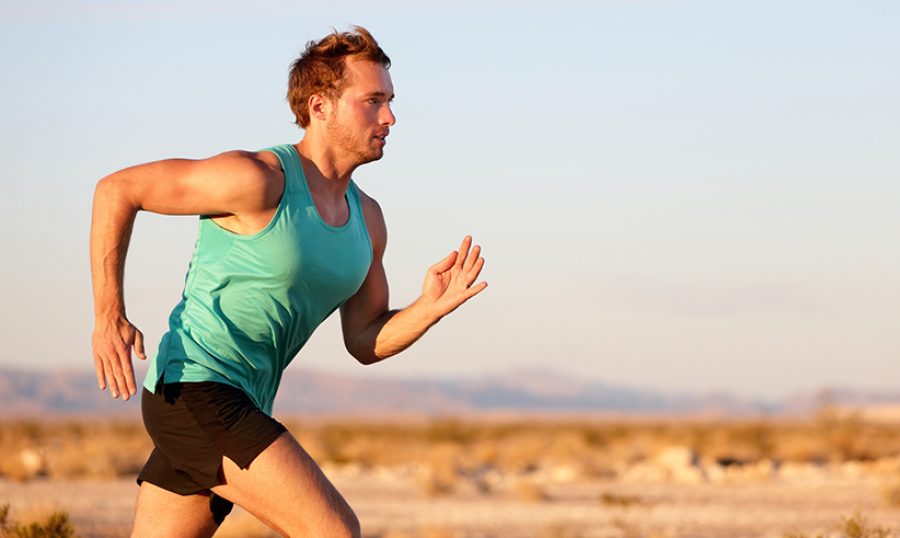 Running man sprinting cross country trail run