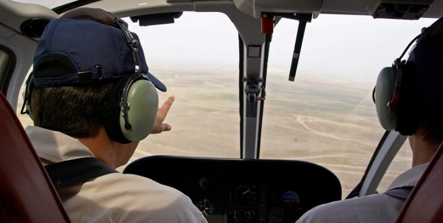 Pilots in helicopter cabin