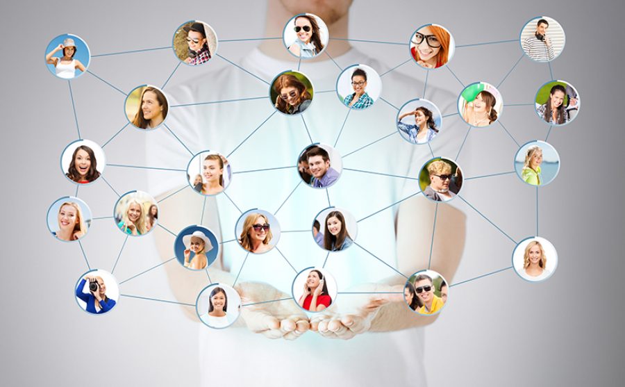 mans hands showing social network