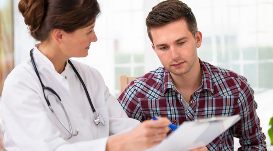 Doctor with male patient