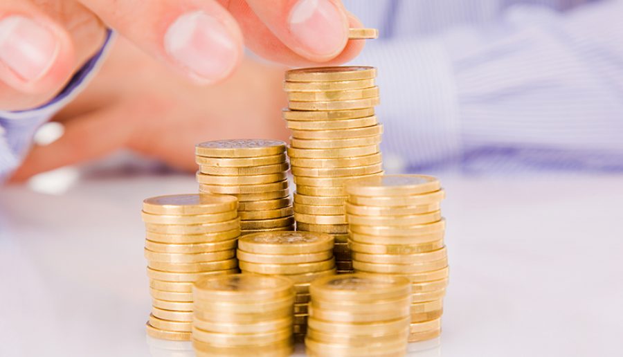 Increase your savings, hand holding coin