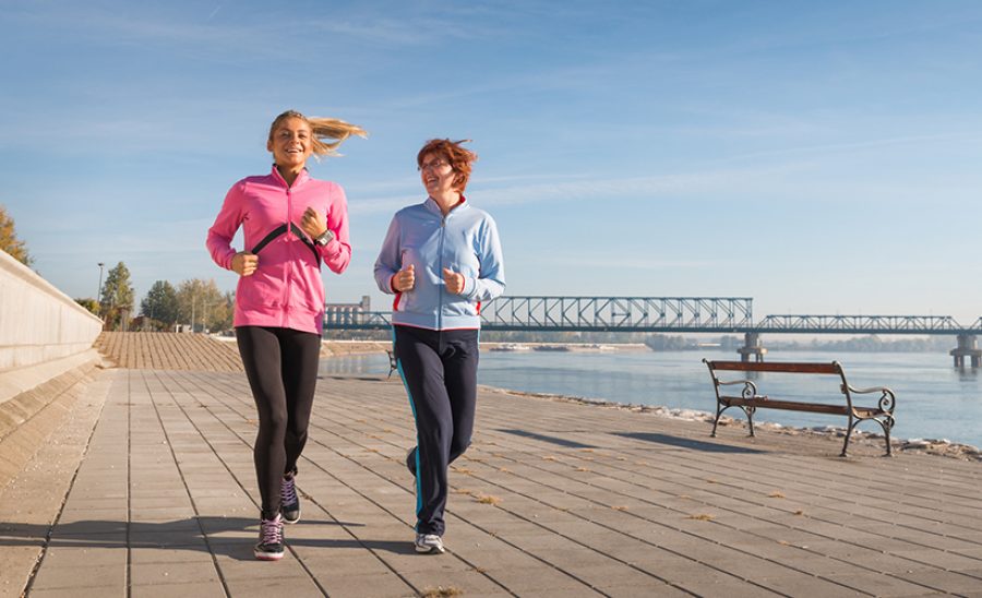 Mother and daughter jogging