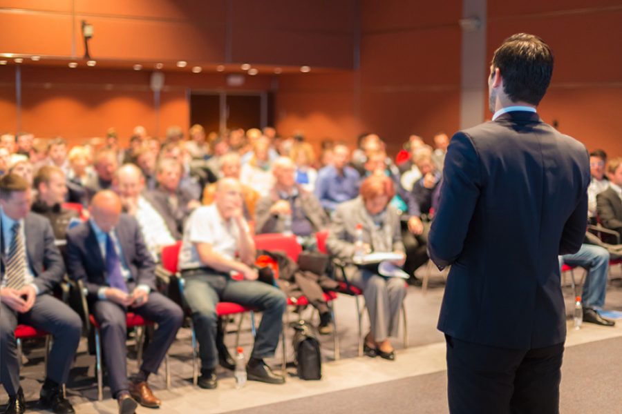 Speaker at Business Conference and Presentation.