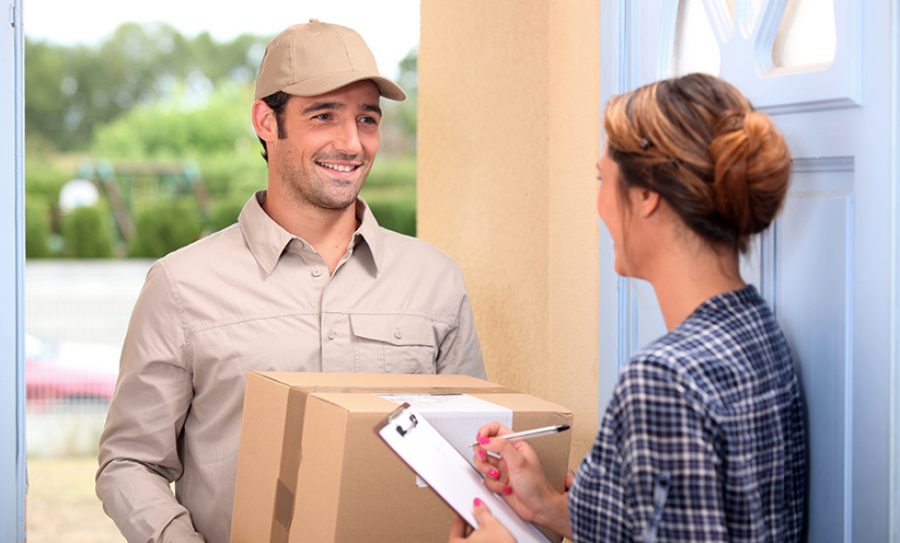 Courier delivering a parcel
