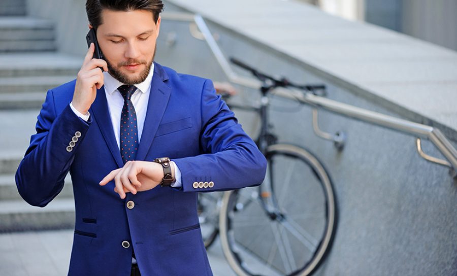 Nice businessman talking on mobile phone