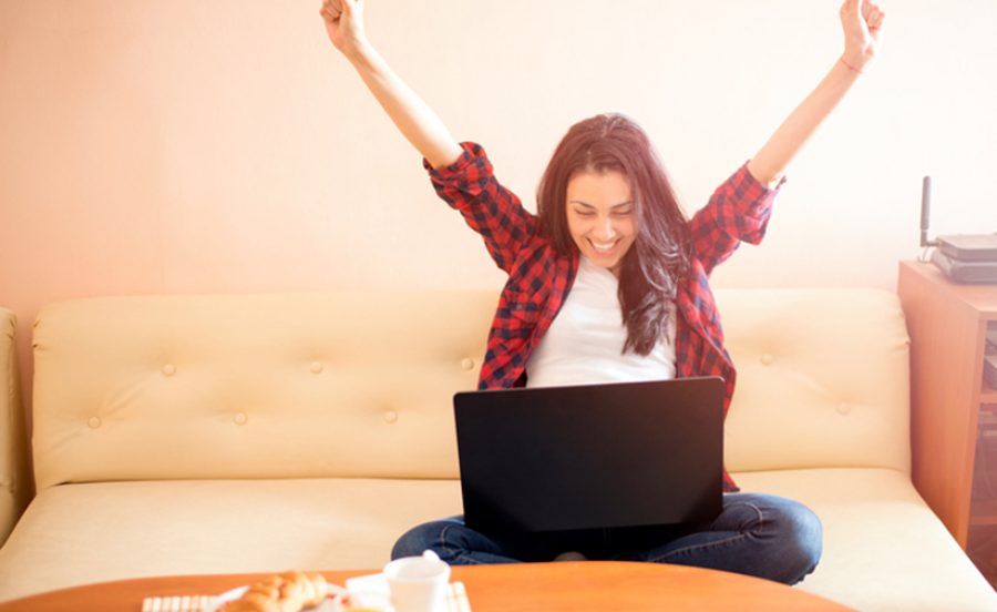 Happy woman with laptop